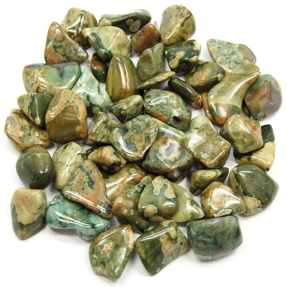 Natural tumbled rainforest rhyolite crystal pebbles with green orbicular patterns and quartz pockets for crystal grids.